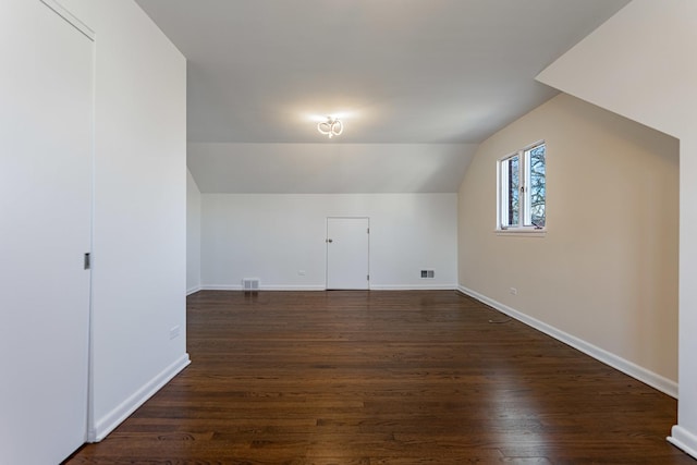 4313 Elm Ave, Lyons, IL 60534 - bonus room featuring vaulted ceiling and dark wood-style floors