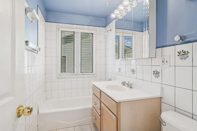 1019 Rockland Rd, Lake Bluff, IL 60044 - bathroom with vanity, tile walls, a tub, and backsplash