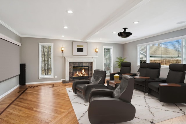 1019 Rockland Rd, Lake Bluff, IL 60044 - living area featuring crown molding, wood finished floors, recessed lighting, and a tile fireplace