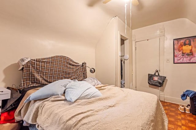 bedroom featuring baseboards and a ceiling fan