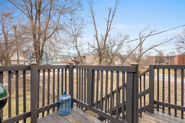 wooden deck with a residential view