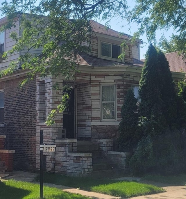 8037 S Princeton Ave, Chicago, IL 60620 - view of front facade featuring stone siding