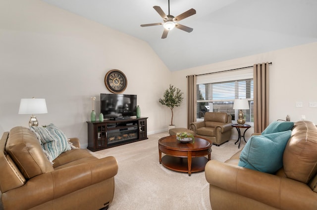 living area with light carpet, baseboards, lofted ceiling, and a ceiling fan