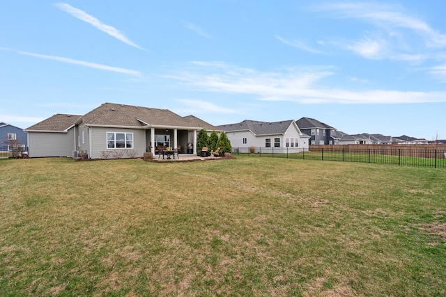 view of yard with a patio, central air condition unit, and a fenced backyard