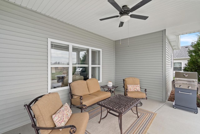 view of patio featuring an outdoor living space, area for grilling, and ceiling fan