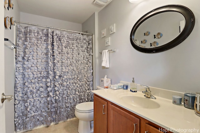 1242 Chesterton Dr Unit 2, Fox Lake, IL 60020 - bathroom with vanity, toilet, and curtained shower