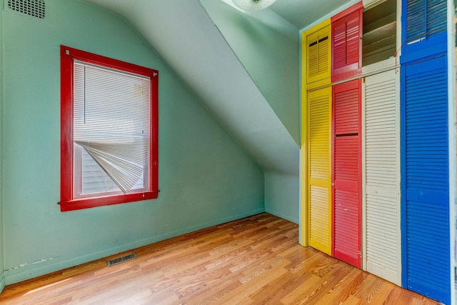 3134 W 39th Pl, Chicago, IL 60632 - additional living space with vaulted ceiling and light wood-style flooring