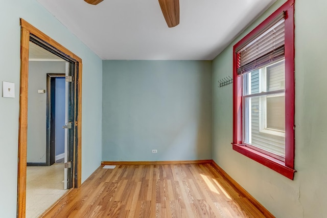 3134 W 39th Pl, Chicago, IL 60632 - empty room with ceiling fan and light wood-style flooring