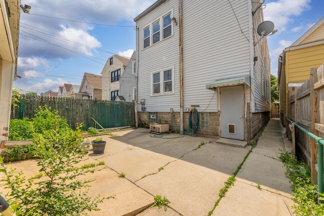 3134 W 39th Pl, Chicago, IL 60632 - back of property with a fenced backyard and a patio area