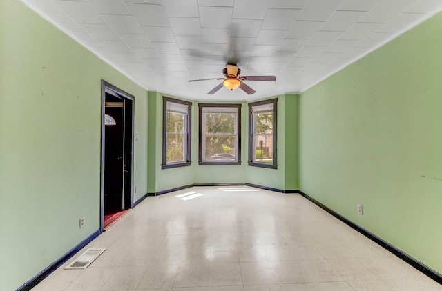 3134 W 39th Pl, Chicago, IL 60632 - empty room with ceiling fan and baseboards
