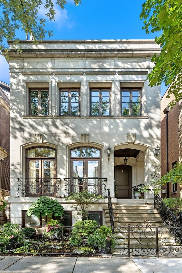 view of building exterior with a fenced front yard