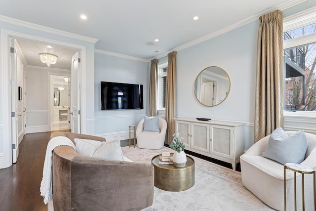 living area featuring dark wood-type flooring, ornamental molding, baseboards, and recessed lighting