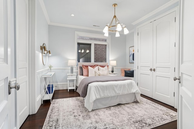 bedroom featuring recessed lighting, ornamental molding, dark wood-type flooring, and visible vents