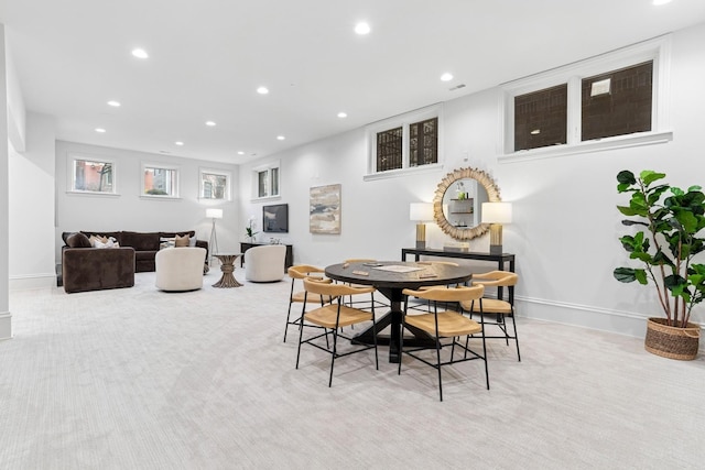 dining area featuring carpet floors and recessed lighting