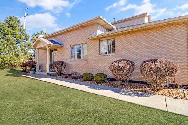 11042 Quail Dr, Mokena, IL 60448 - view of front facade featuring crawl space, a front yard, and brick siding