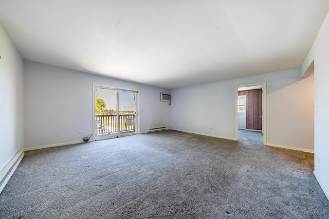 empty room with carpet floors, a wealth of natural light, and a baseboard radiator