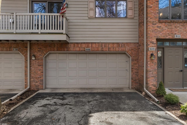 garage featuring driveway