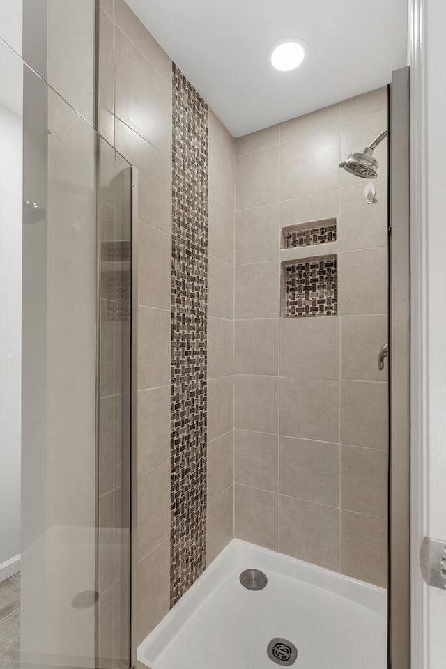 full bathroom featuring a stall shower