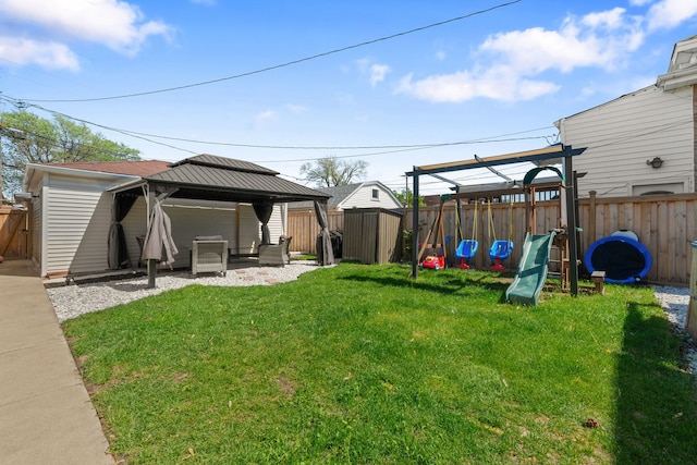 view of yard with a playground and a gazebo