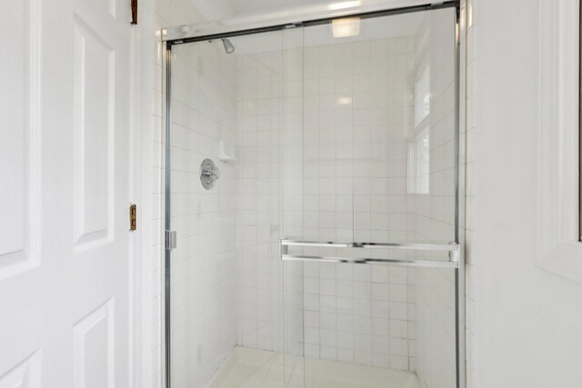 bathroom featuring a stall shower