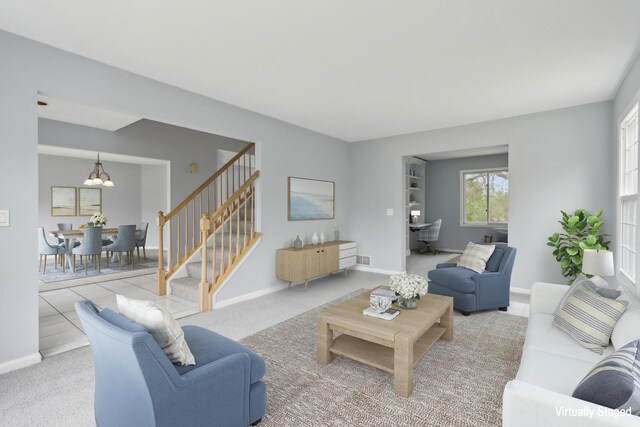carpeted living area with baseboards, a chandelier, and stairway