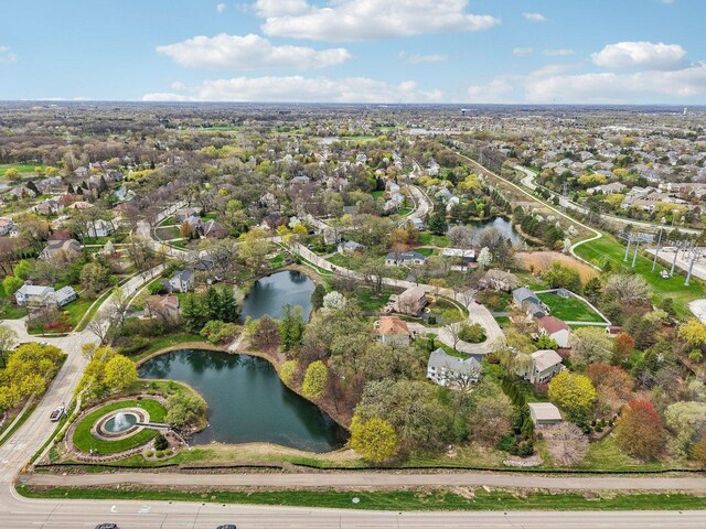 aerial view with a water view and a residential view