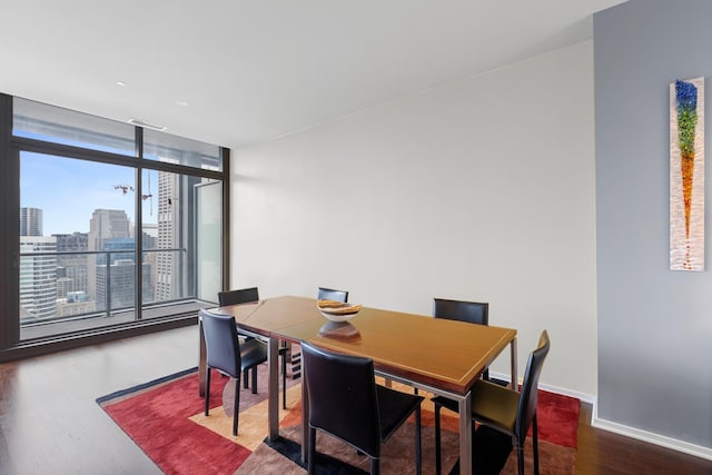 65 E Monroe St Unit 4315, Chicago, IL 60603 - dining area with wood finished floors, baseboards, and a city view