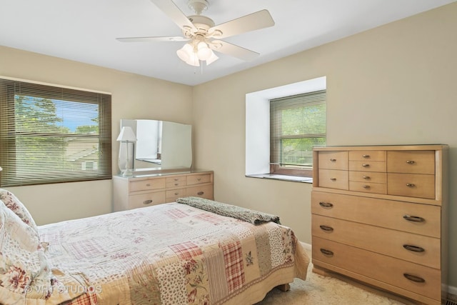 610 N Rohlwing Rd, Palatine, IL 60074 - bedroom with light carpet and ceiling fan