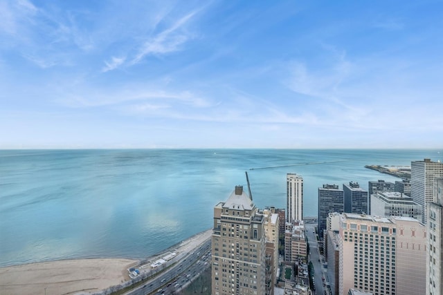 exterior space featuring a city view and a water view