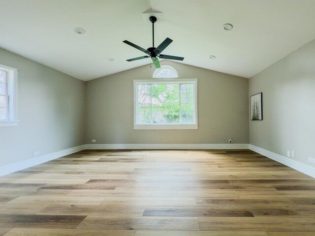 13110 W Playfield Dr, Crestwood, IL 60418 - spare room featuring a ceiling fan, wood finished floors, and lofted ceiling