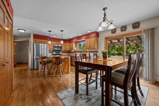 2527 Ryan Ct, Naperville, IL 60564 - dining room featuring light wood finished floors and recessed lighting