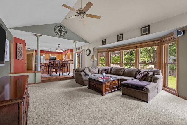 2527 Ryan Ct, Naperville, IL 60564 - living room featuring ornate columns, light colored carpet, a ceiling fan, a chandelier, and high vaulted ceiling