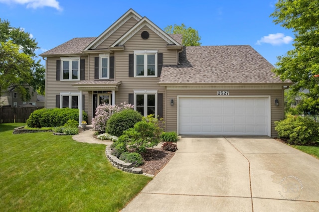 2527 Ryan Ct, Naperville, IL 60564 - view of front facade with driveway, a garage, and a shingled roof