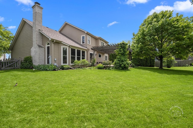 2527 Ryan Ct, Naperville, IL 60564 - back of house featuring a pergola, a chimney, and roof with shingles