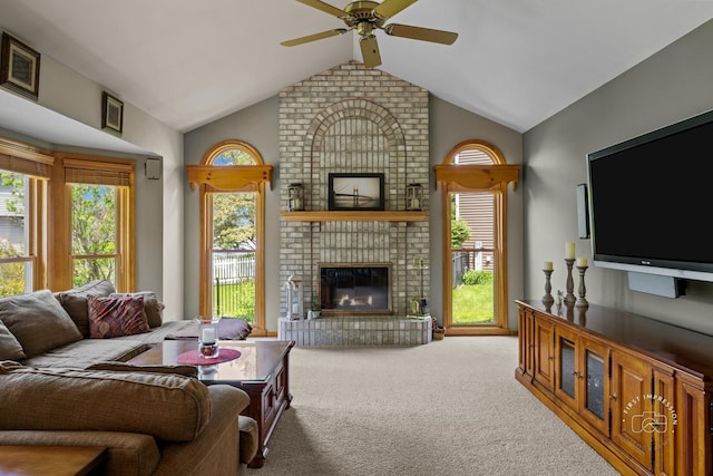 2527 Ryan Ct, Naperville, IL 60564 - living room with a fireplace, a ceiling fan, carpet, plenty of natural light, and high vaulted ceiling