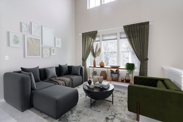 living room with a high ceiling