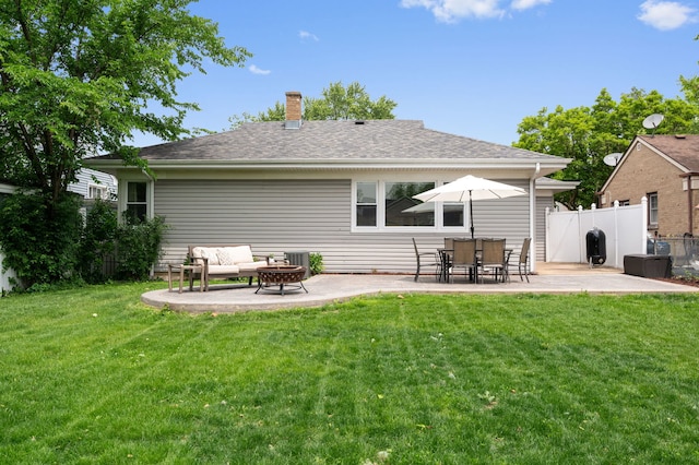 231 W Hickory Rd, Lombard, IL 60148 - rear view of house featuring a patio, a chimney, and a shingled roof