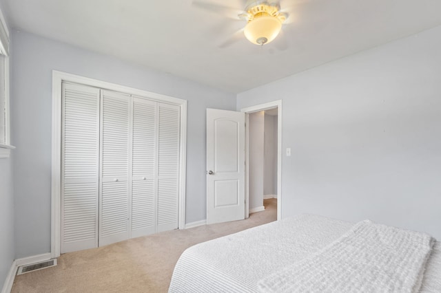 231 W Hickory Rd, Lombard, IL 60148 - bedroom with light colored carpet, a closet, and ceiling fan