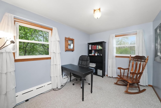 office featuring baseboards, a baseboard radiator, and carpet