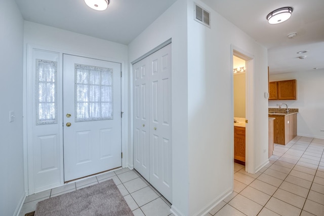 3924 Garnette Ct, Naperville, IL 60564 - foyer featuring light tile patterned floors, baseboards, and visible vents