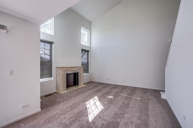 3924 Garnette Ct, Naperville, IL 60564 - unfurnished living room with high vaulted ceiling, visible vents, carpet floors, a premium fireplace, and baseboards
