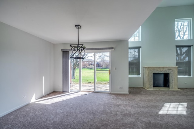 3924 Garnette Ct, Naperville, IL 60564 - unfurnished living room with a premium fireplace, baseboards, and carpet floors