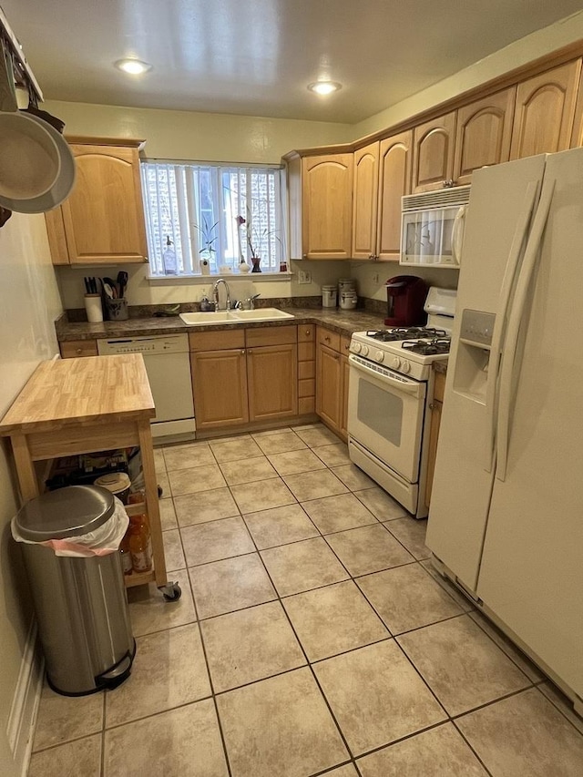 1324 W Greenleaf Ave Unit 1B, Chicago, IL 60626 - kitchen with white appliances, a sink, light tile patterned floors, light brown cabinets, and recessed lighting