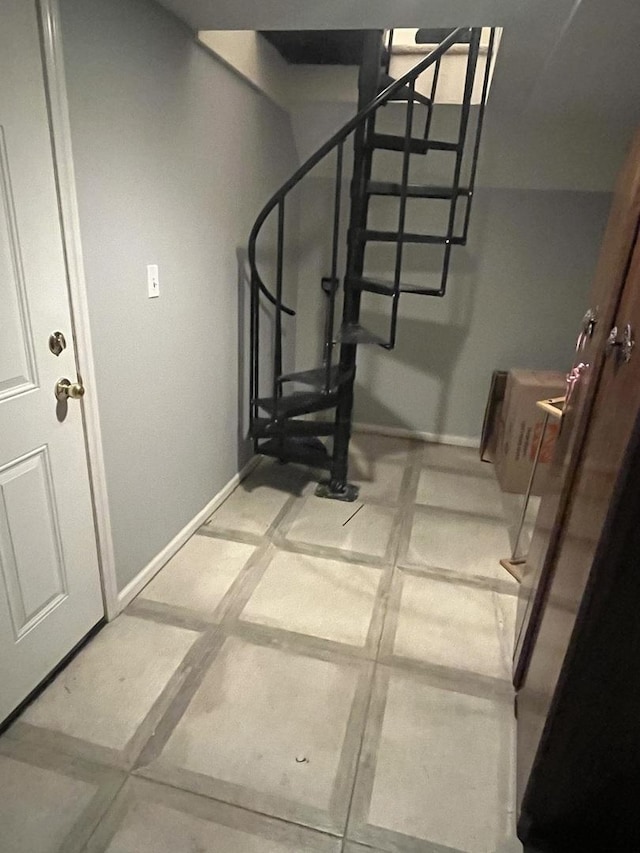 1324 W Greenleaf Ave Unit 1B, Chicago, IL 60626 - stairway featuring baseboards