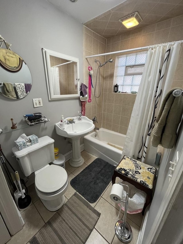 1324 W Greenleaf Ave Unit 1B, Chicago, IL 60626 - full bathroom with toilet, shower / bath combo with shower curtain, and tile patterned flooring