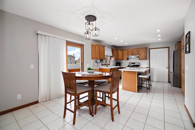 909 Revere St, Bourbonnais, IL 60914 - dining room featuring baseboards, recessed lighting, and light tile patterned floors