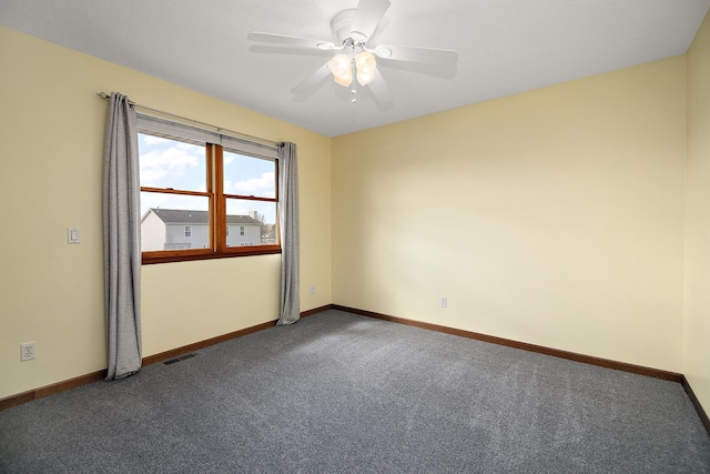 909 Revere St, Bourbonnais, IL 60914 - carpeted spare room with a ceiling fan, baseboards, and visible vents