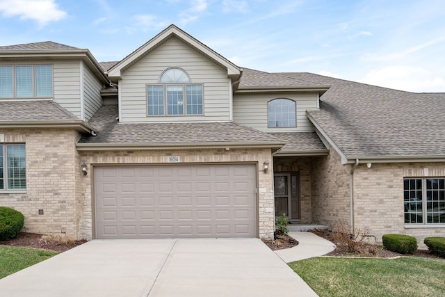 16054 S Alissa Ct, Homer Glen, IL 60491 - view of front of home with a shingled roof, a garage, concrete driveway, and brick siding