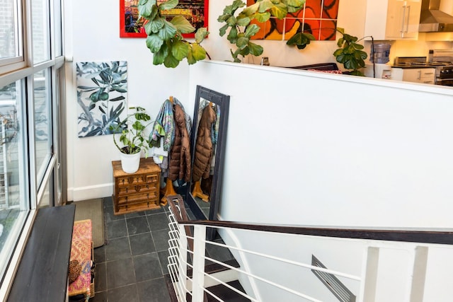 844 W Webster Ave, Chicago, IL 60614 - stairs featuring tile patterned flooring and baseboards