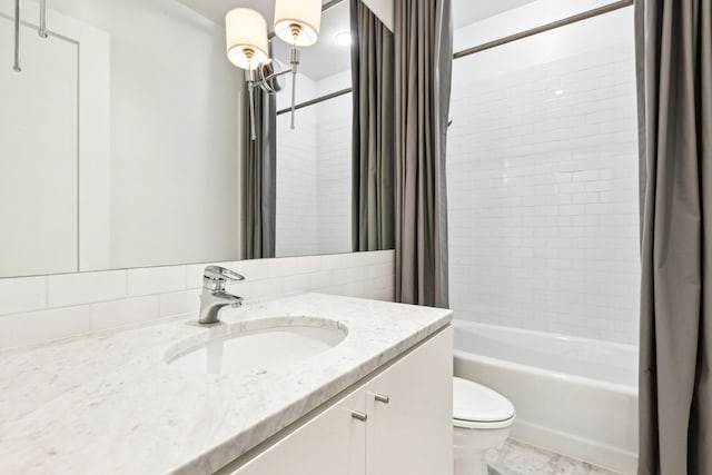 844 W Webster Ave, Chicago, IL 60614 - bathroom with toilet, shower / bath combo with shower curtain, and vanity